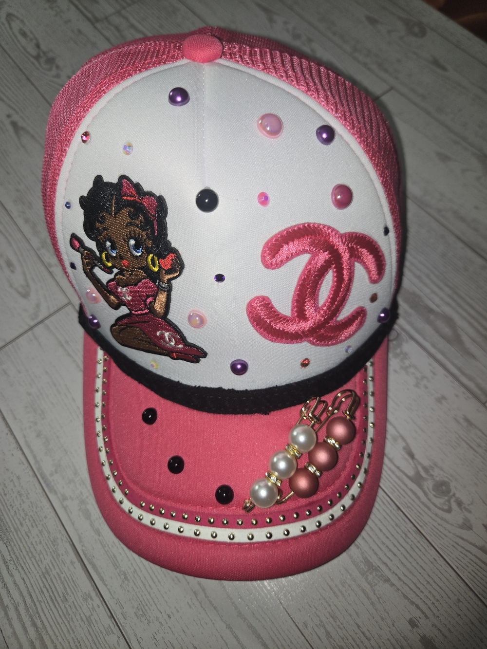 Pink Trucker Cap with Embroidered Character and Interlocking Logo